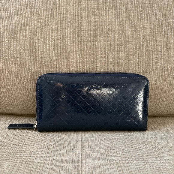 Lacoste Handbags - Lacoste blue zip up bi-fold wallet Excellent Condition